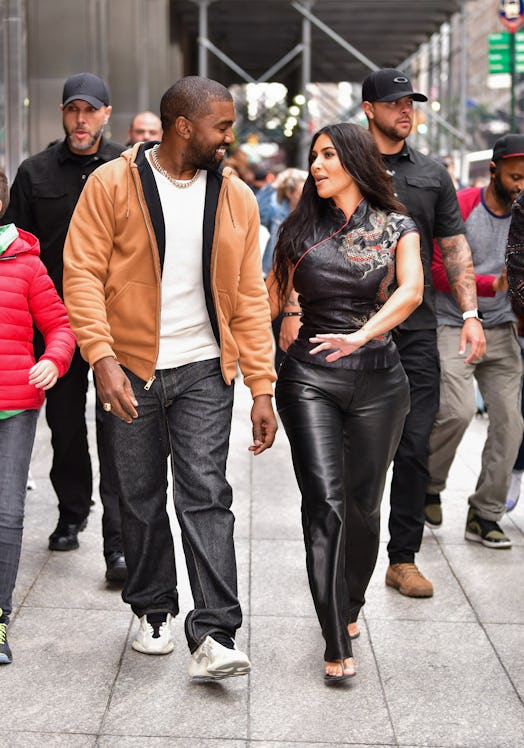 NEW YORK, NY - OCTOBER 25:  Kanye West and Kim Kardashian West walk along 57th Street on October 25,...