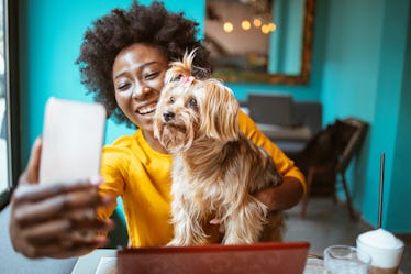 On Mother's Day, a woman uses dog mom quotes for Instagram.