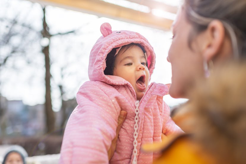 Take your baby outdoors for some fresh air and sensory activity.