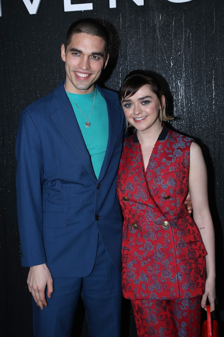 PARIS, FRANCE - MARCH 01: (EDITORIAL USE ONLY) Maisie Williams and her boyfriend Reuben Selby attend...