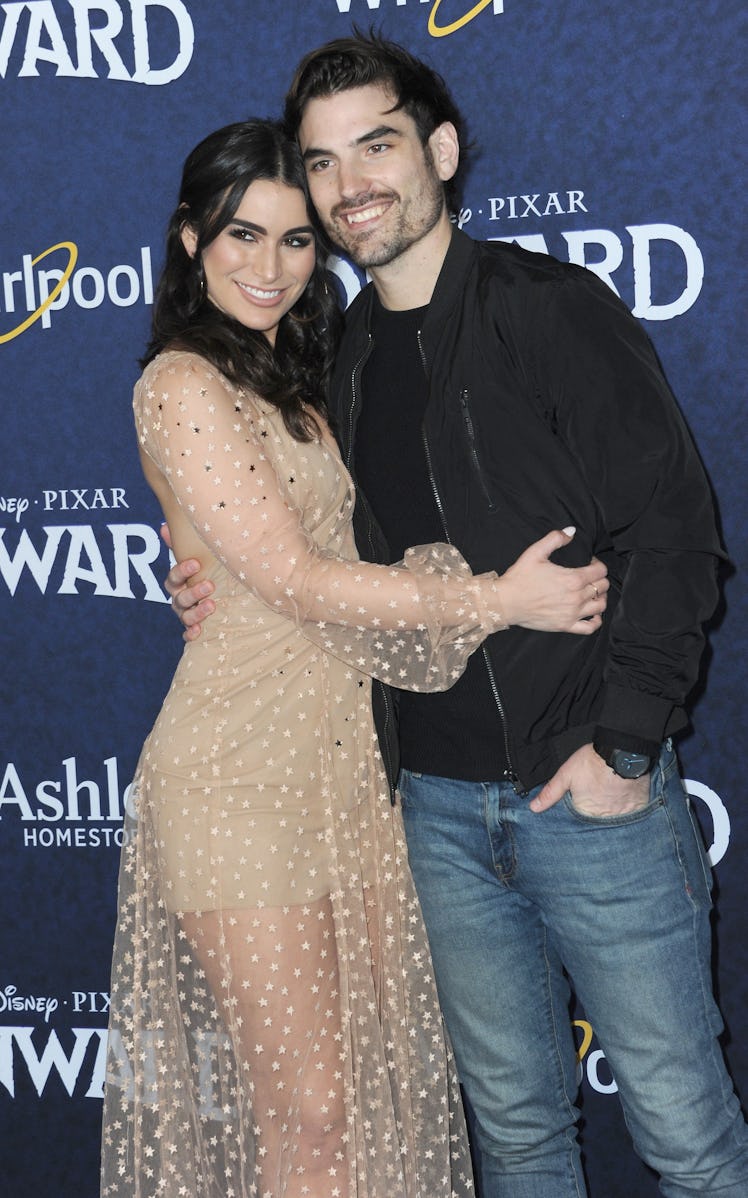 HOLLYWOOD, CA - FEBRUARY 18:  Ashley Iaconetti and Jared Haibon arrive for Premiere Of Disney And Pi...