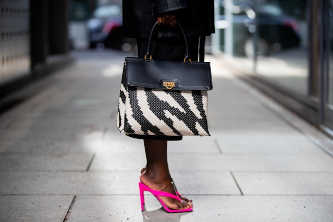 BERLIN, GERMANY - FEBRUARY 25: Lois Opoku is seen wearing black blazer Na-kd, Mango cropped pants, p...