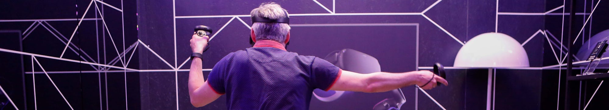 An attendee tries out the new Oculus Quest at the Facebook F8 Conference at McEnery Convention Cente...