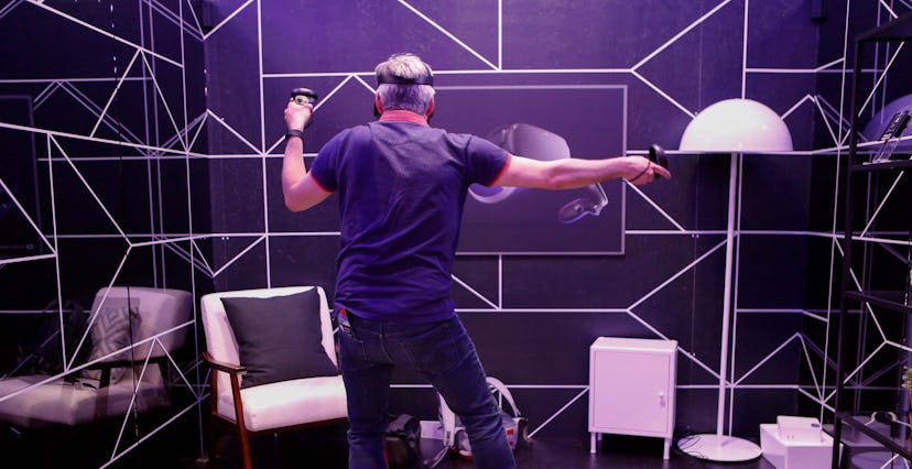 An attendee tries out the new Oculus Quest at the Facebook F8 Conference at McEnery Convention Cente...