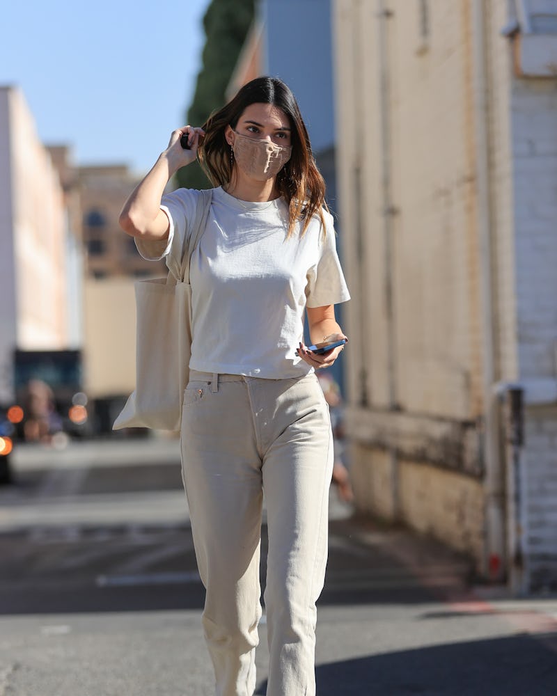Kendall Jenner wears Richer Poorer relaxed crop tee in 2021.