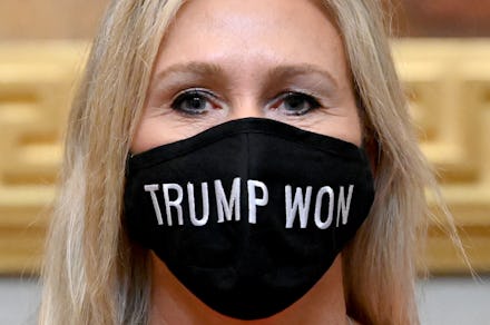 WASHINGTON, DC - JANUARY 3:
Q Anon supporter Marjorie Taylor Greene (R-Ga.) sports a Trump Won mask...