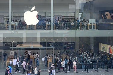 CHENGDU, CHINA - NOVEMBER 17: Customers line up to enter an Apple flagship store at Sino-Ocean Taiko...