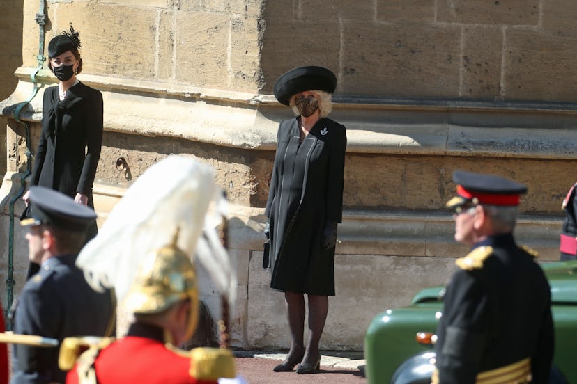 WINDSOR, ENGLAND - APRIL 17: The Duchess of Cambridge (L) and the Duchess of Cornwall watch the proc...