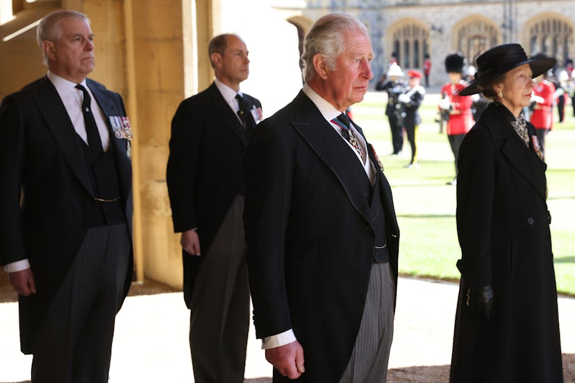 Prince Philip’s children walk behind his casket.