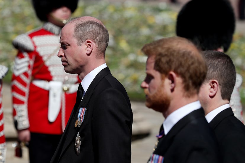 Prince Harry walks behind his grandfather’s coffin.
