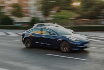 Madrid, Spain - 16 October, 2019: An electric Tesla Model S car in motion in an avenue of Madrid, Sp...