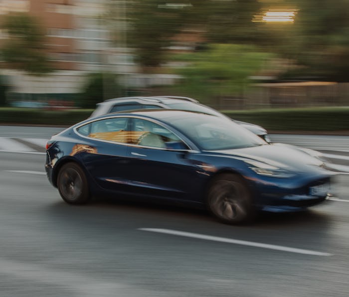 Madrid, Spain - 16 October, 2019: An electric Tesla Model S car in motion in an avenue of Madrid, Sp...