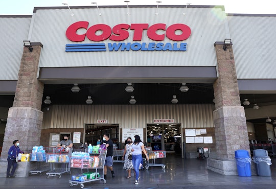 INGLEWOOD, CALIFORNIA - FEBRUARY 25: Shoppers walk in front of a Costco store on February 25, 2021 i...