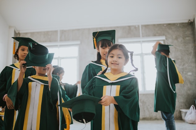 this preschool graduation photo needs a cute preschool graduation instagram caption