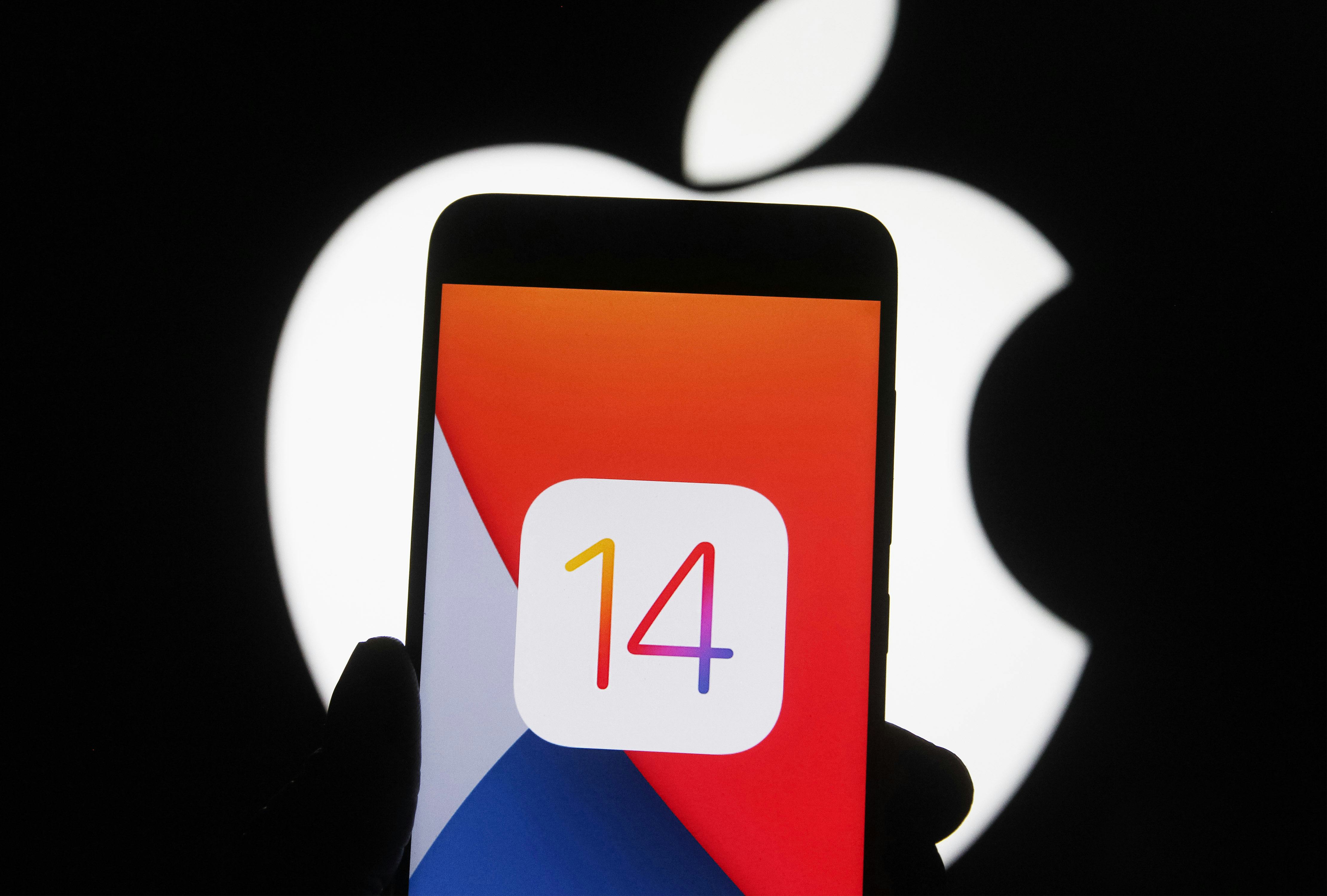 UKRAINE - 2020/10/14: In this photo illustration the iOS 14 logo of the iOS mobile operating system ...