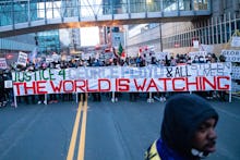 MINNEAPOLIS, MN - APRIL 19: Protesters march around downtown Minneapolis near the courthouse calling...