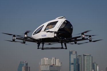 An EHang all-electric Vertical Takeoff and Landing (eVTOL) two-passenger multicopter aircraft, produ...