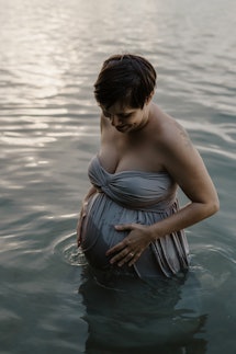 Maternity photoshoots can also be in the water.
