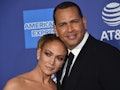 US actress Jennifer Lopez (L) and partner US former baseball player Alex Rodriguez arrive for the 31...
