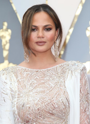 HOLLYWOOD, CA - FEBRUARY 26: Model Chrissy Teigen arrives at the 89th Annual Academy Awards at Holly...