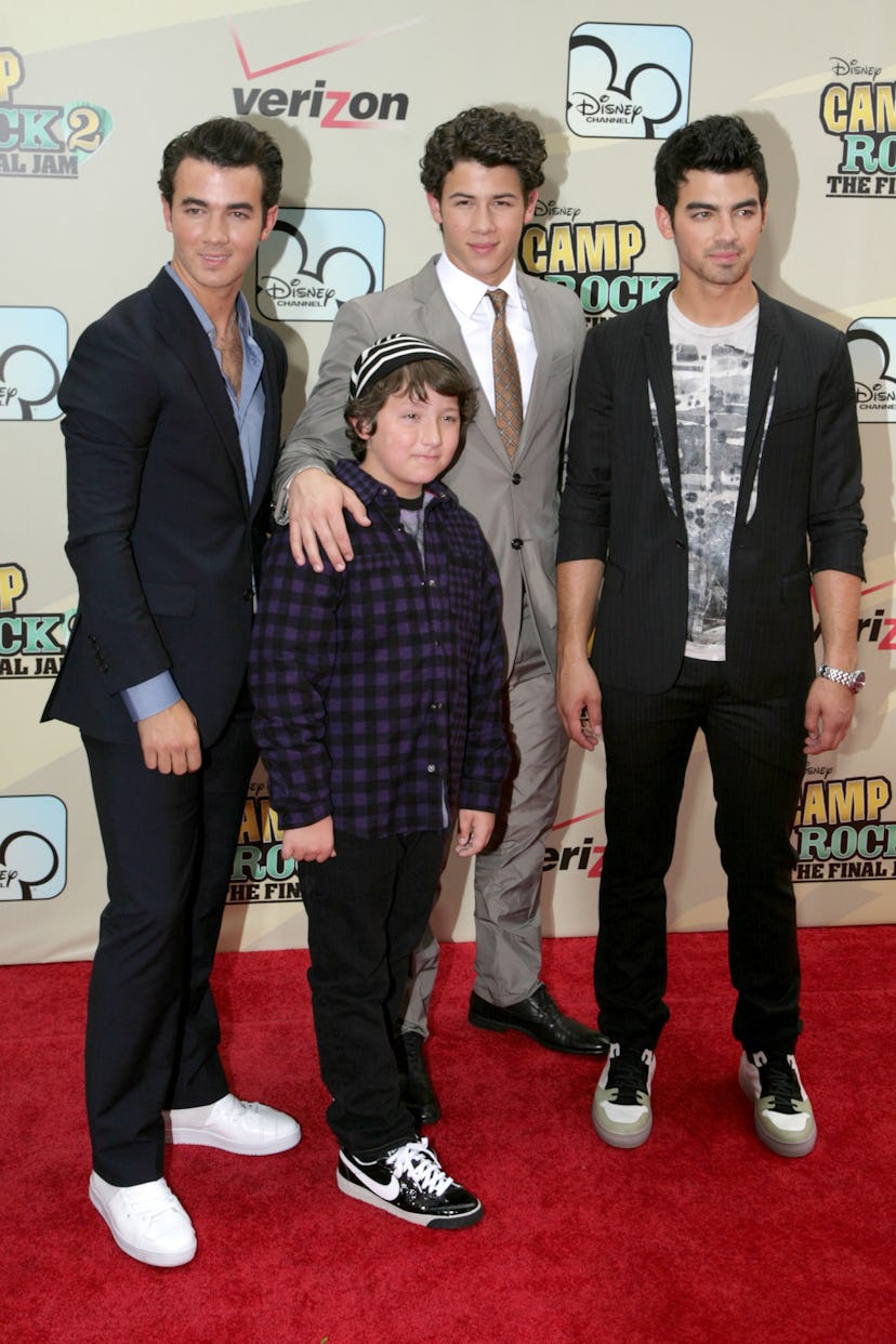 - AUGUST 18: (L-R) Kevin Jonas, Frankie Jonas, Nick Jonas and Joe Jonas attend Disney Channel Hosts ...