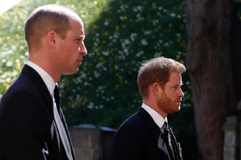 TOPSHOT - Britain's Prince William, Duke of Cambridge (L) and Britain's Prince Harry, Duke of Sussex...