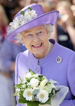 STEVENAGE, ENGLAND - JUNE 14:  Queen Elizabeth II arrives to open a new maternity ward at the Lister...