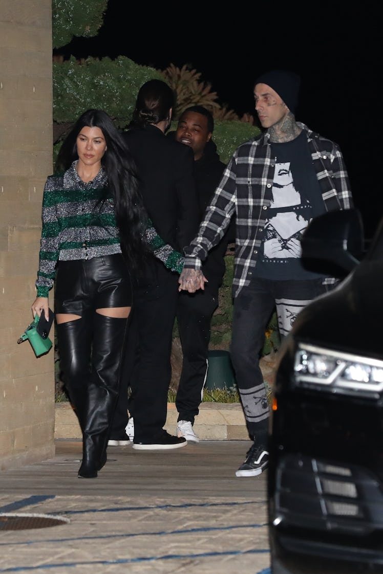 MALIBU, CA - MARCH 20: Kourtney Kardashian and Travis Barker are seen at Nobu restaurant on March 20...