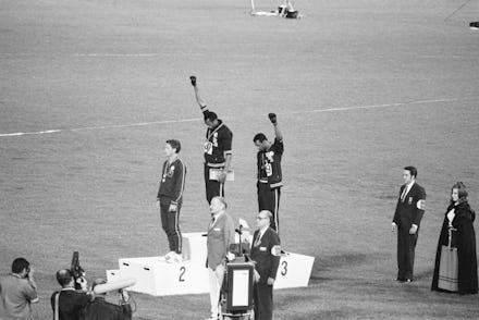 Tommie Smith and John Carlos, gold and bronze medalists in the 200-meter run at the 1968 Olympic Gam...