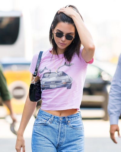 Kendall Jenner wears lilac baby tee in 2018.