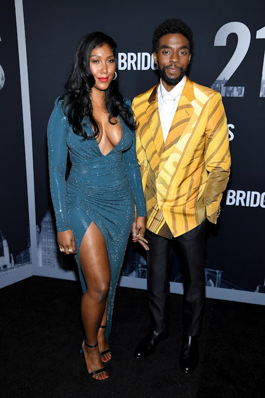 NEW YORK, NEW YORK - NOVEMBER 19: Taylor Simone Ledward and Chadwick Boseman attend the "21 Bridges"...