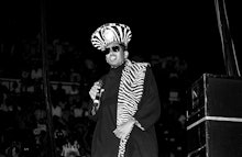 INDIANAPOLIS - JULY 1990:  Rapper Shock G. of Digital Underground performs at Market Square Arena in...