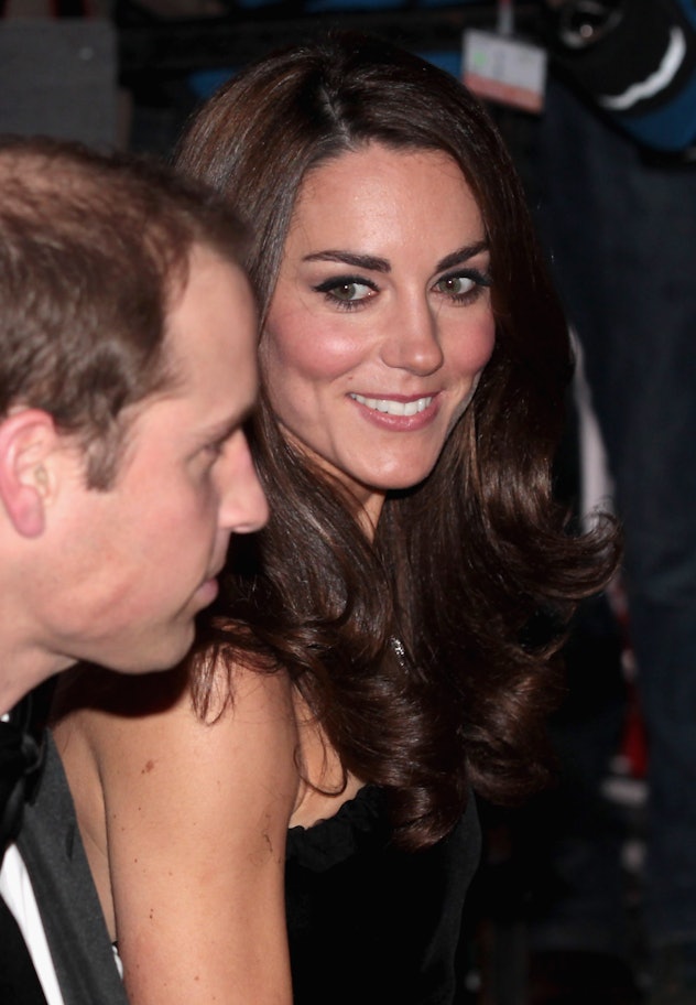 LONDON, ENGLAND - DECEMBER 19:  Catherine, Duchess of Cambridge looks towards Prince William, Duke o...