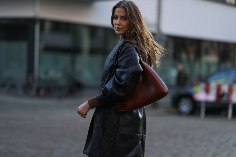 BERLIN, GERMANY - DECEMBER 08: Nicole Poturalski wearing wrstbehavior coat and byfar bag on December...