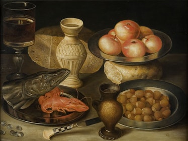 Still life with Siegburg stoneware jug, glass, knife, two loaves, three pewter plates with hazelnuts...