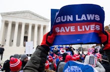 Supporters of gun control and firearm safety measures hold a protest rally outside the US Supreme Co...