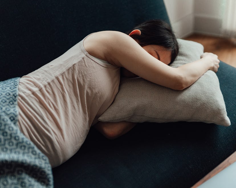 Young Asian pregnant woman feeling fatigued and exhausted during pregnancy. Pregnancy health care co...