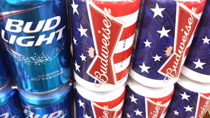 Los Angeles, California, USA - July 1, 2013: Budweiser, the quintessential American beer, issues beer cans commemorating July 4th. The beer stays cool on market shelf while on display.