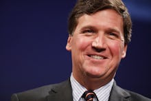 WASHINGTON, DC - MARCH 29: Fox News host Tucker Carlson discusses 'Populism and the Right' during th...