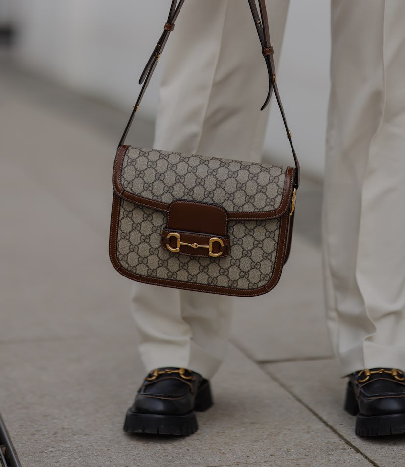 HAMBURG, GERMANY - APRIL 15: Milena Karl wearing beige Zara pants and Gucci bag and black loafers on...