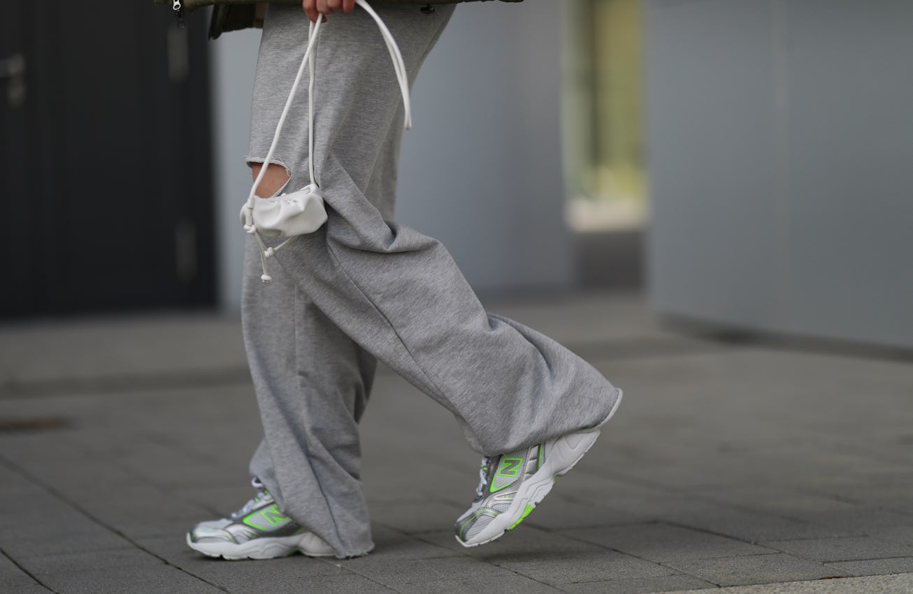 DUSSELDORF, GERMANY - FEBRUARY 27: Maria Barteczko wearing grey Bershka jogging pants, white green N...