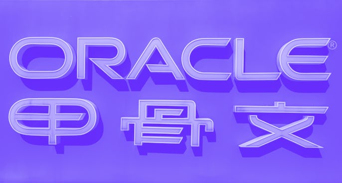 Oracle company signage is seen in front of the US-based technology company's office building in Beij...