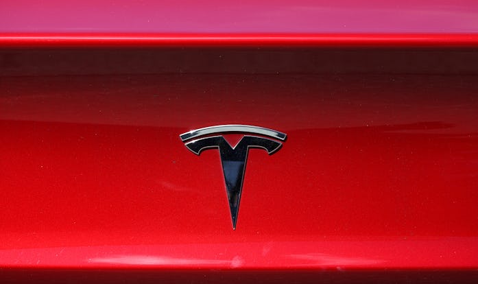 CORTE MADERA, CALIFORNIA - APRIL 26: The Tesla logo is displayed on a Tesla car on April 26, 2021 in...