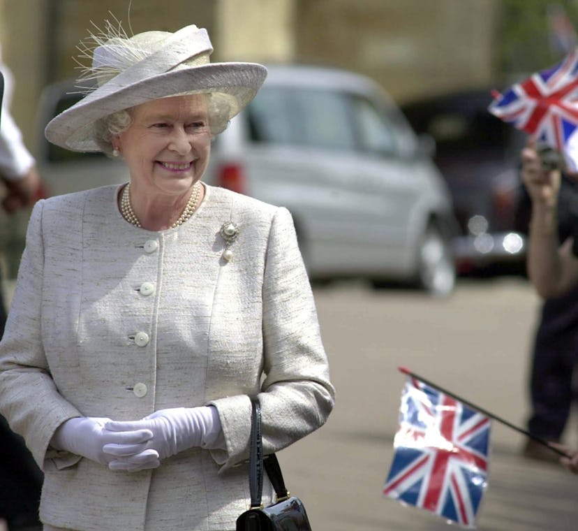 Queen Elizabeth II leaves St Georges Chapel at Windsor Castle, 02 June 2002, after a service to mark...