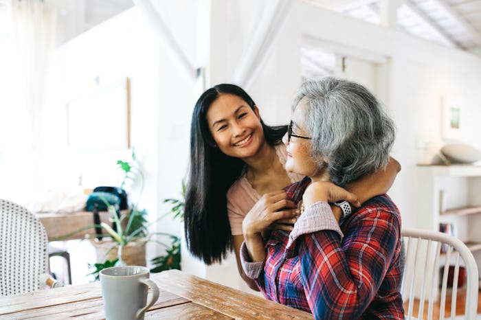 granddaughter giving affordable mother's day gift that only seems expensive