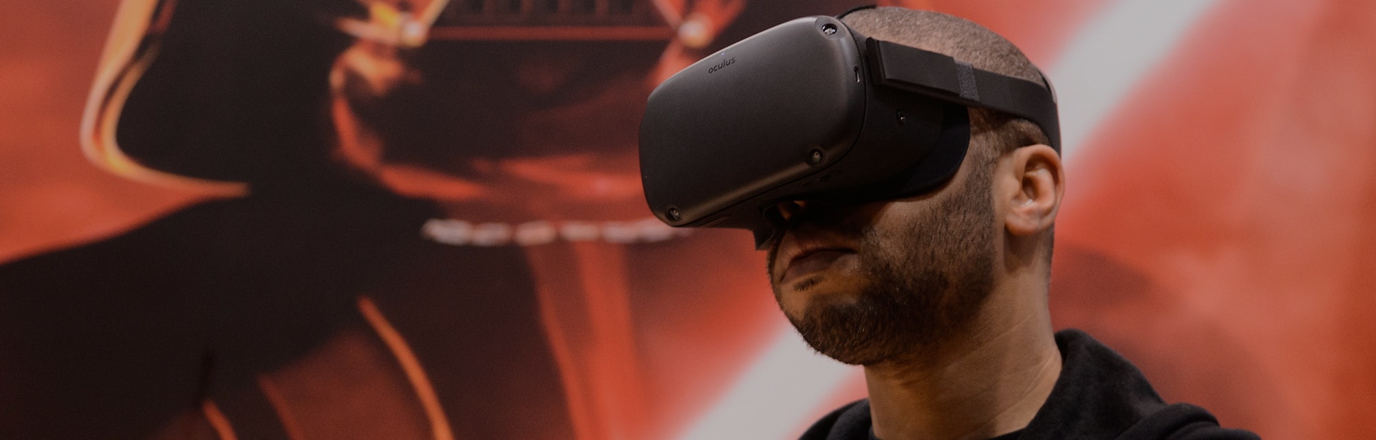 CHICAGO, IL - APRIL 15:  An attendee plays the 'Vader Immortal: A Star Wars VR Series" experience on...