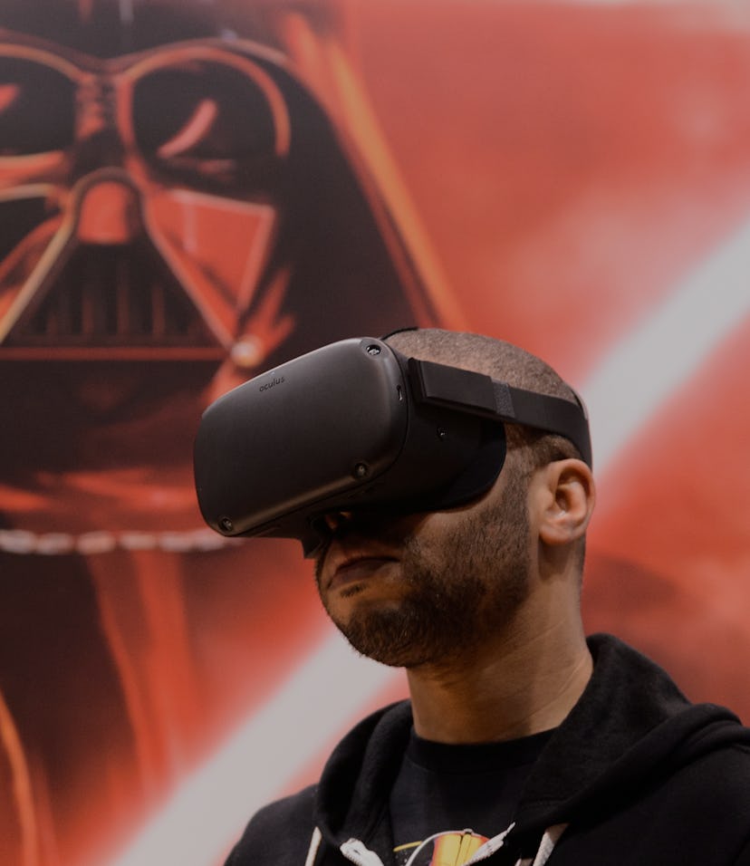CHICAGO, IL - APRIL 15: An attendee plays the 'Vader Immortal: A Star Wars VR Series" experience on...