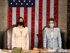 US Vice President Kamala Harris (L) and Speaker of the US House of Representatives Nancy Pelosi, Dem...