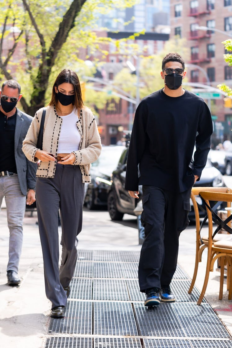 NEW YORK, NEW YORK - APRIL 24: Kendall Jenner (L) and Devin Booker are seen in SoHo on April 24, 202...