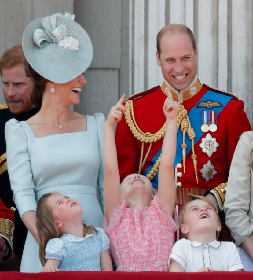 Prince William and Kate Middleton laugh together.